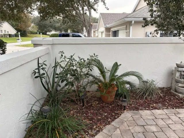a view of a balcony with plants
