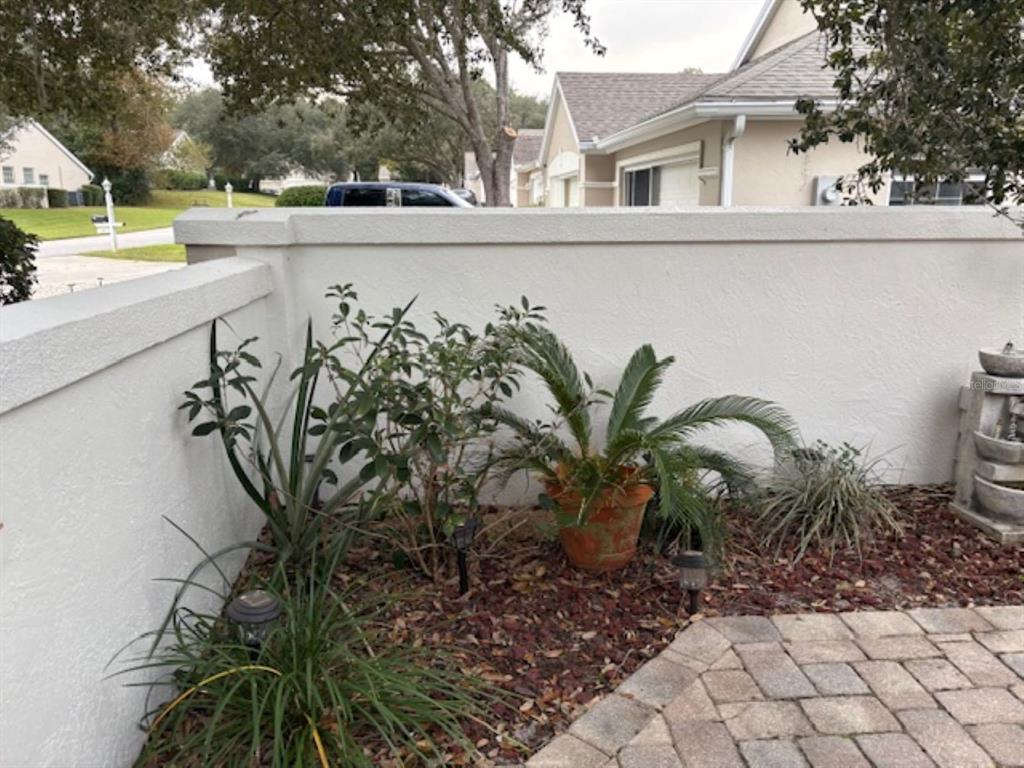7867 Southwest 115th Loop Ocala, FL 34476 - Photo 4 of 40 a view of a balcony with plants