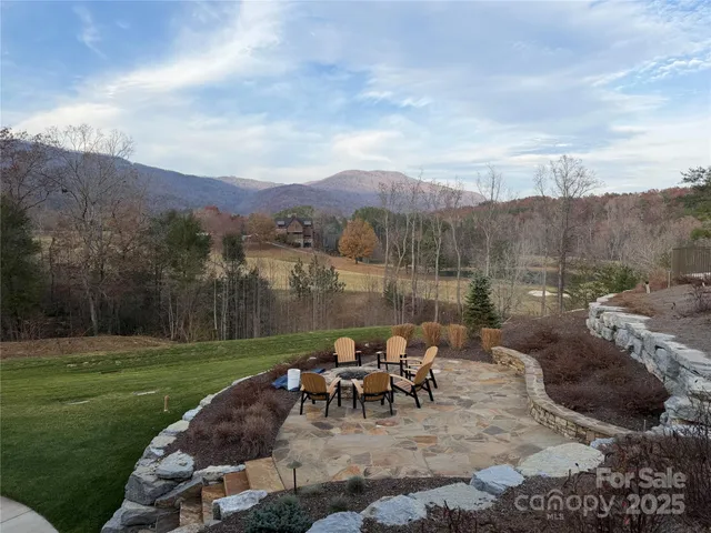 a view of a lake with a yard