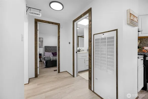 a view of a bedroom from a hallway