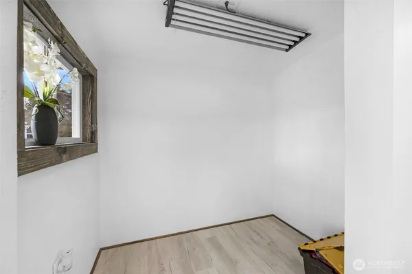 a view of small space with wooden floor