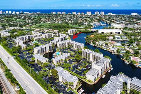 a view of a lake with a building in the background