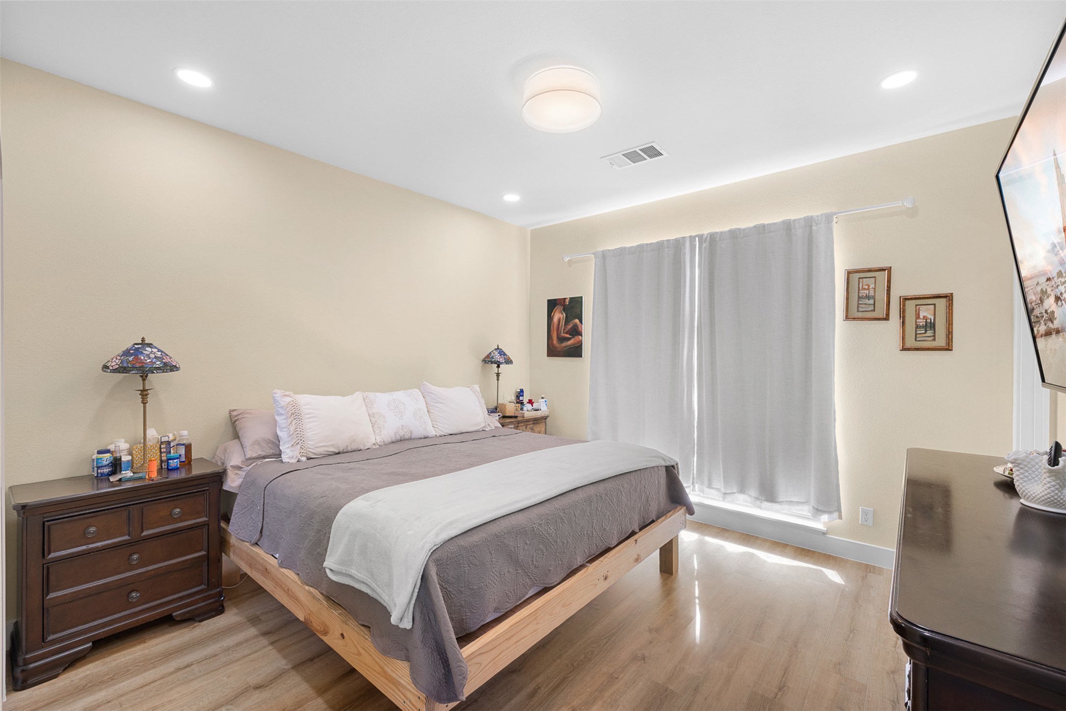 1759 Gotier Trace Road Paige, TX 78659 - Photo 20 of 40 a bedroom with a bed and a dresser