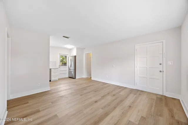 a view of a livingroom with wooden floor