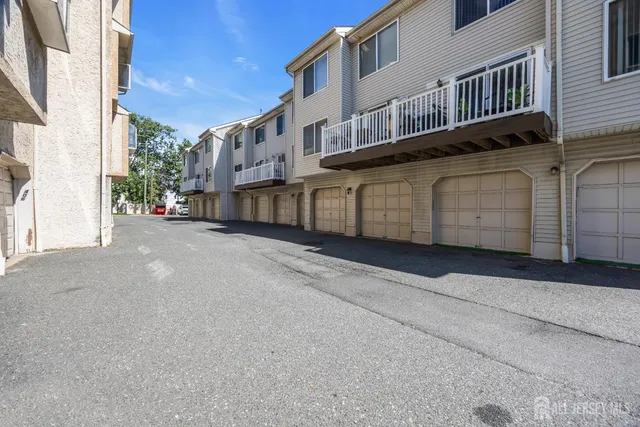 a view of a house with a street