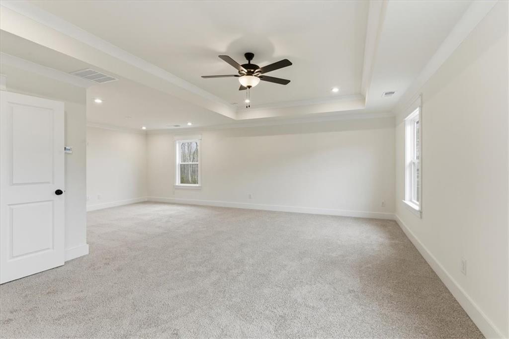 4749 Cooling Water Circle Powder Springs, GA 30127 - Photo 14 of 35 an empty room with fan and windows