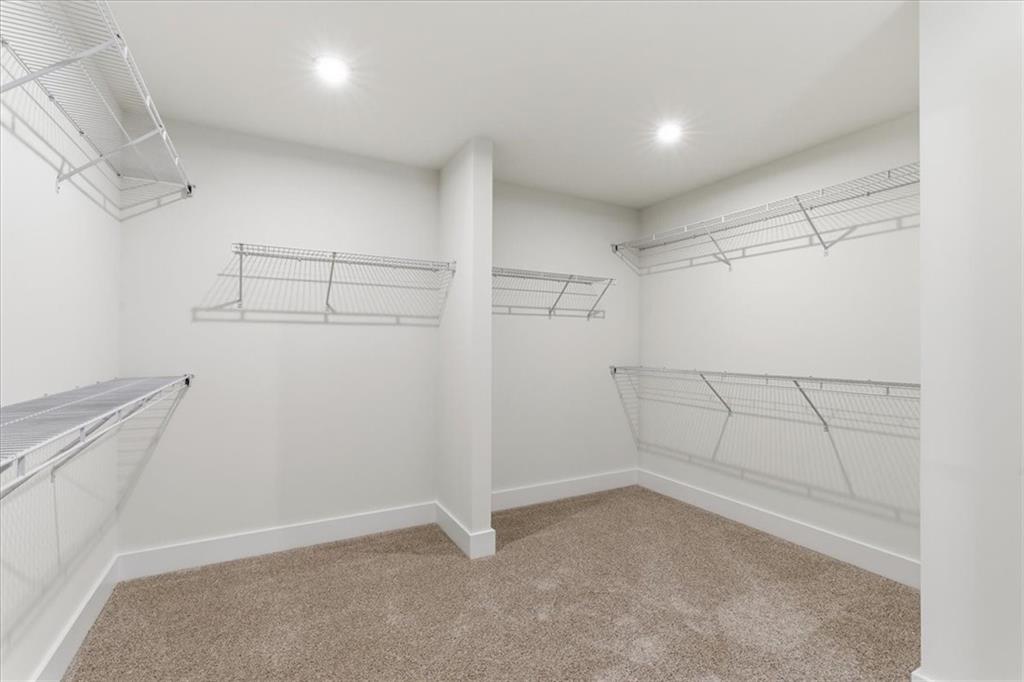 4749 Cooling Water Circle Powder Springs, GA 30127 - Photo 20 of 35 a view of a room with racks on the wall