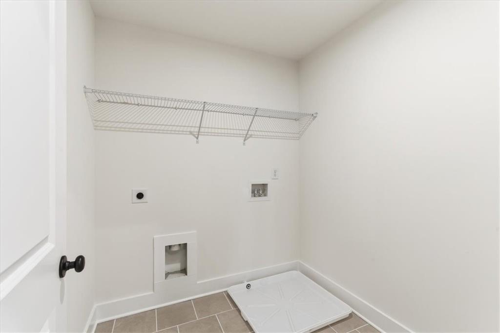 4749 Cooling Water Circle Powder Springs, GA 30127 - Photo 26 of 35 a view of a room with shelf on the wall