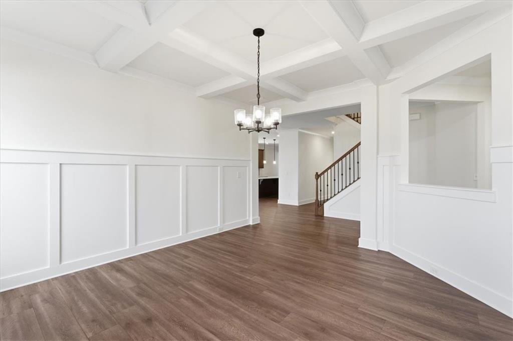 4749 Cooling Water Circle Powder Springs, GA 30127 - Photo 3 of 35 a view of a room with wooden floor chandelier and entryway