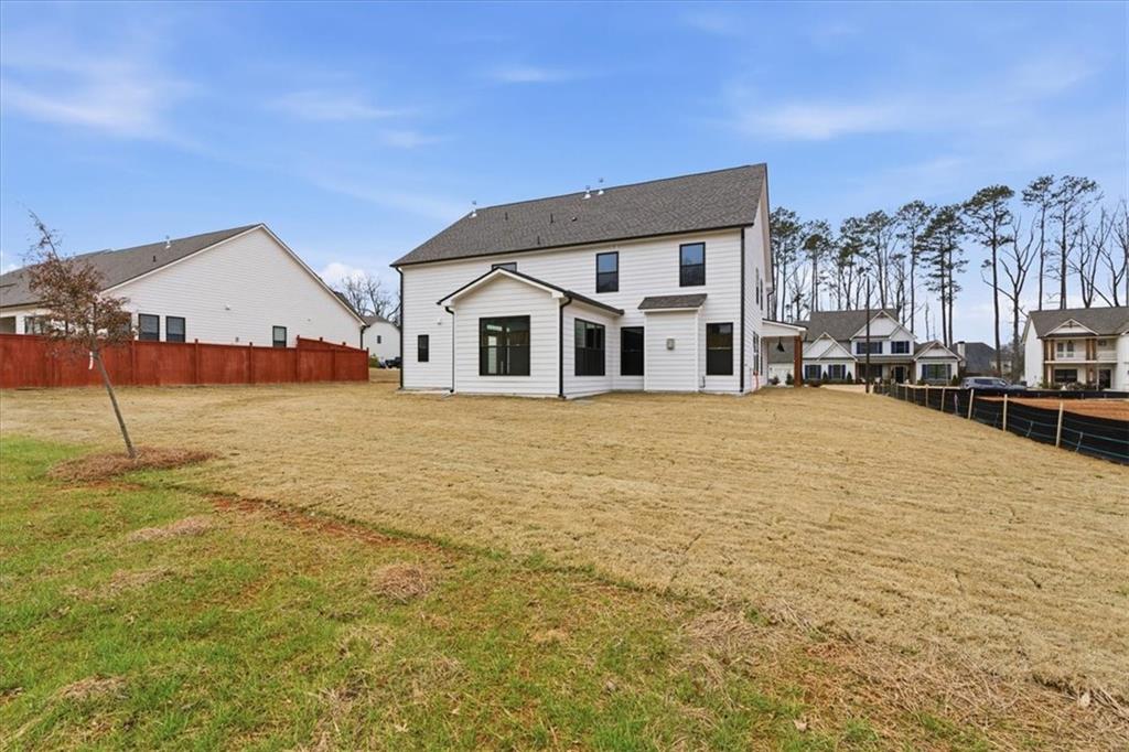4749 Cooling Water Circle Powder Springs, GA 30127 - Photo 33 of 35 a front view of a building with a yard