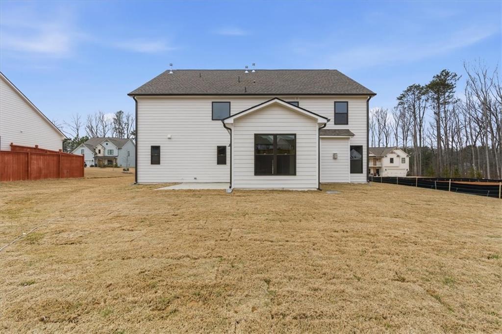 4749 Cooling Water Circle Powder Springs, GA 30127 - Photo 35 of 35 a front view of a house with a yard