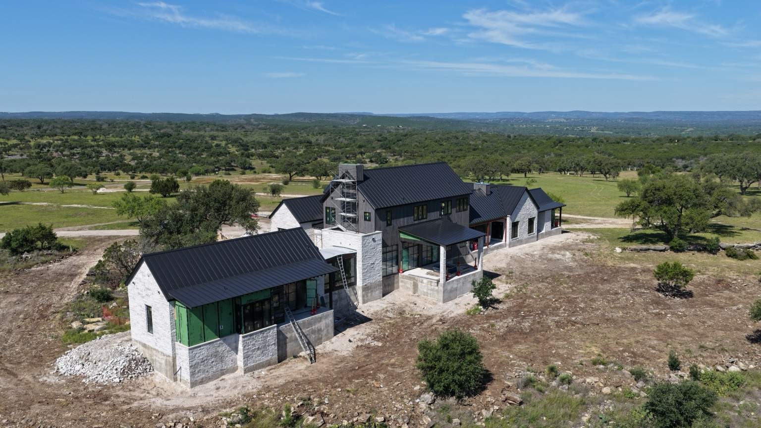 3531 Rm-3347 Round Mountain Round Mountain, TX 78663 - Photo 6 of 13 an aerial view of a house with a yard and lake view