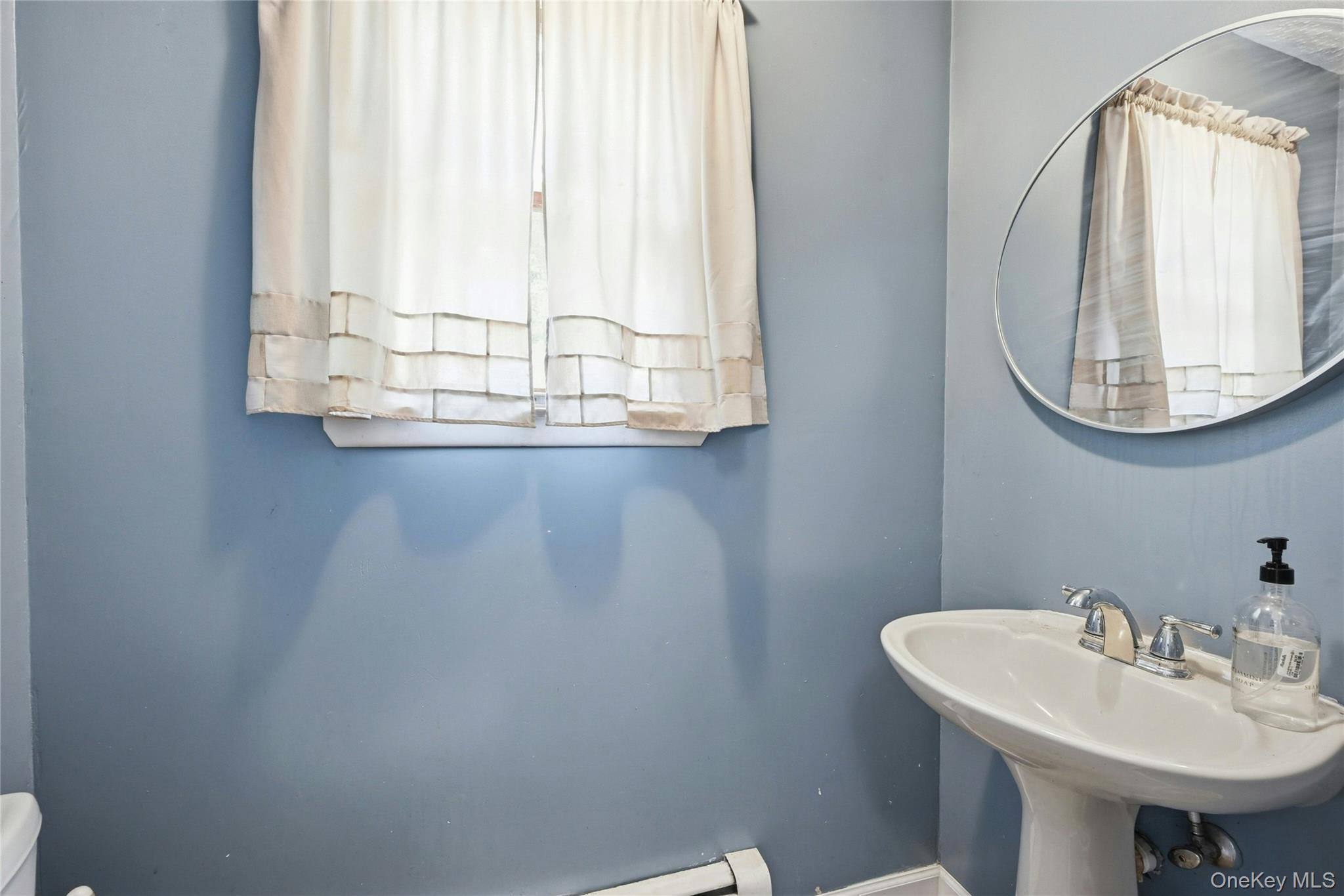 15 Birch Road Rocky Point, NY 11778 - Photo 13 of 30 Powder room on main floor