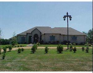 1305 Flagg Road Dixon, IL 61021 - Photo 1 of 1 a house view with a garden space