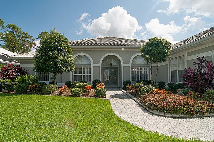 698 Sawgrass Bridge Road Venice, FL 34292 - Photo 1 of 1 Striking entrance