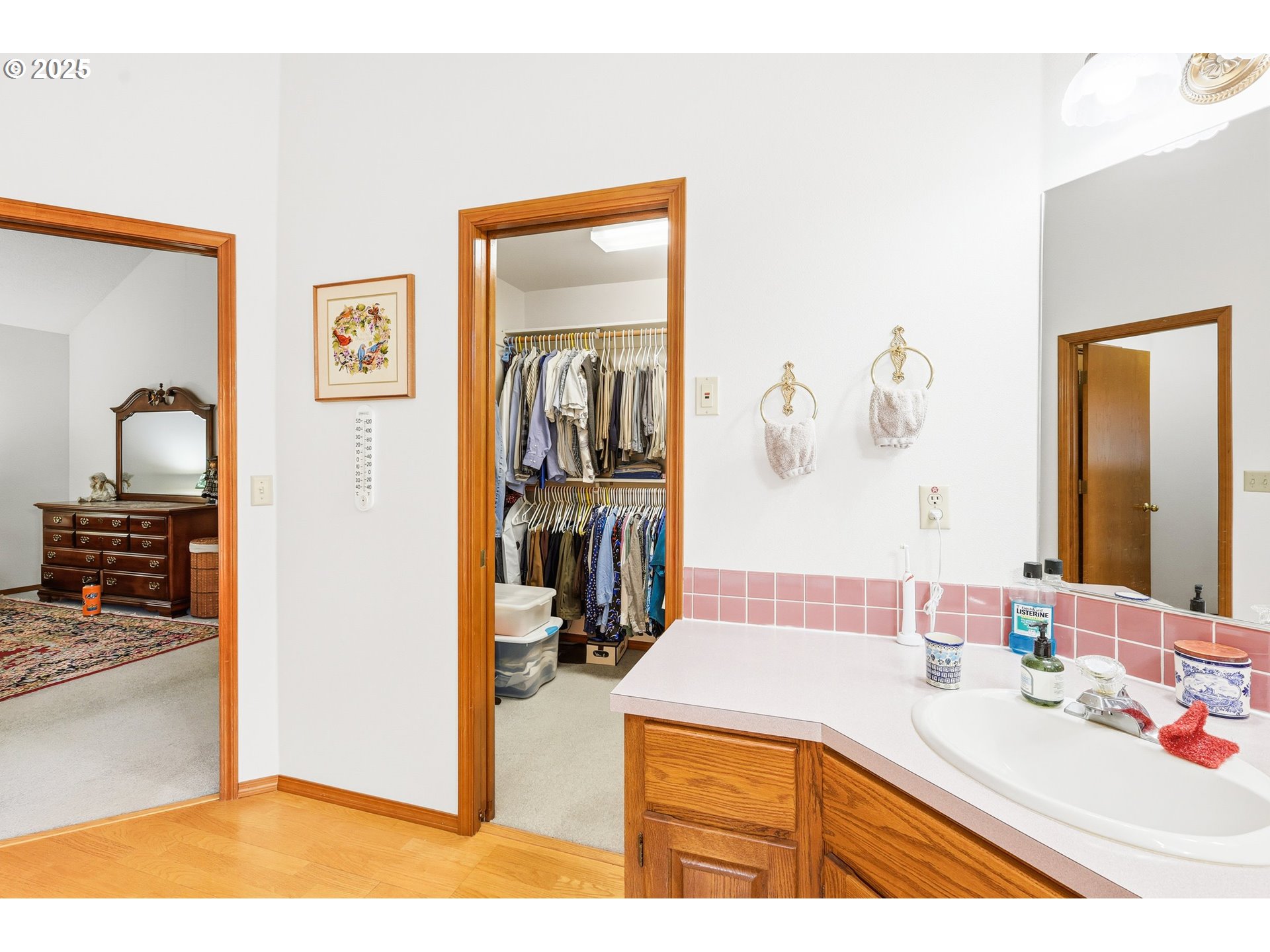 16395 Southwest Sumac Street Beaverton, OR 97007 - Photo 14 of 33 a bathroom with a sink and a mirror