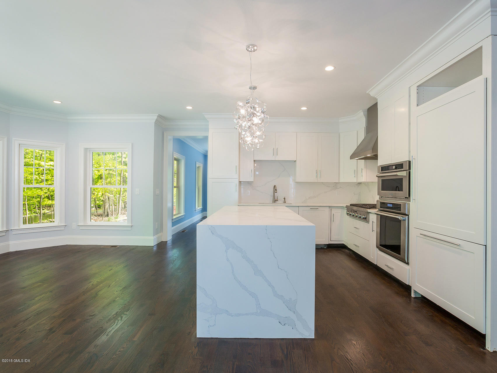 1041 Stillwater Road Stamford, CT 06902 - Photo 16 of 41 a kitchen with a sink stainless steel appliances and window