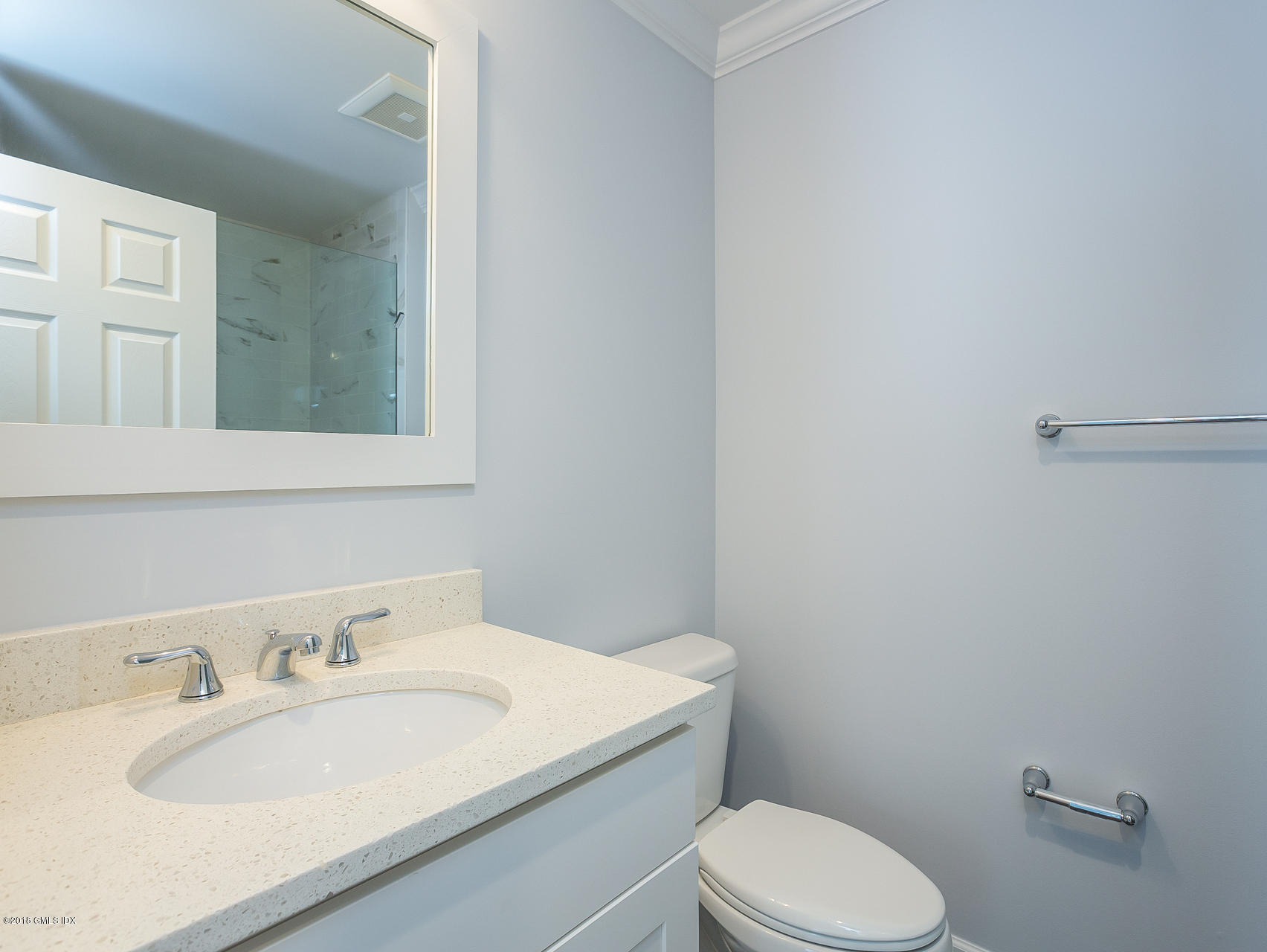 1041 Stillwater Road Stamford, CT 06902 - Photo 34 of 41 a bathroom with a sink toilet and mirror