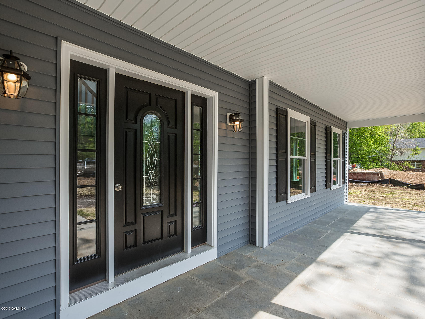 1041 Stillwater Road Stamford, CT 06902 - Photo 35 of 41 a view of a entryway door front of house