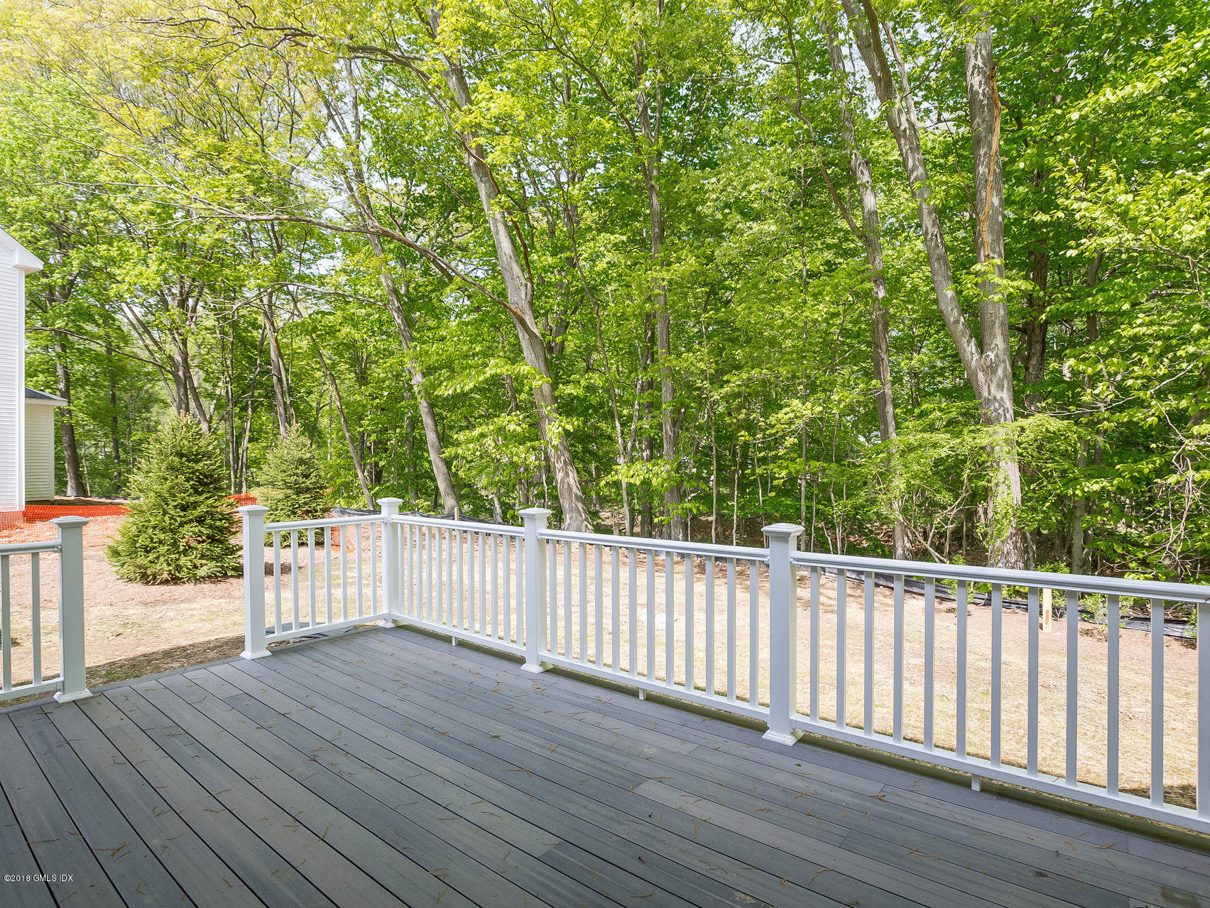 1041 Stillwater Road Stamford, CT 06902 - Photo 36 of 41 a view of a deck with wooden floor and fence