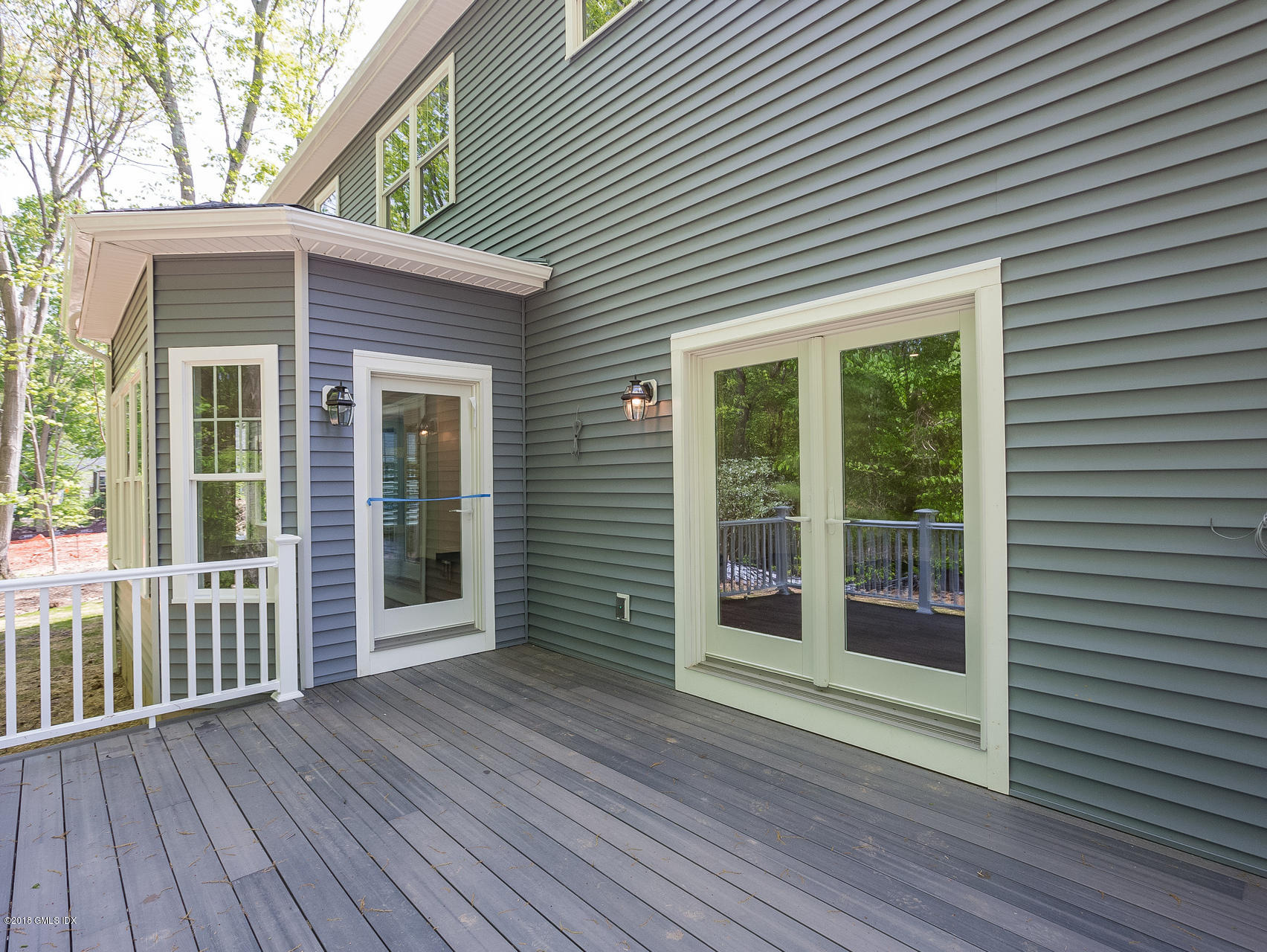 1041 Stillwater Road Stamford, CT 06902 - Photo 37 of 41 a view of a house with a porch