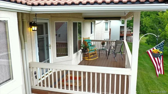 a view of a house with wooden fence