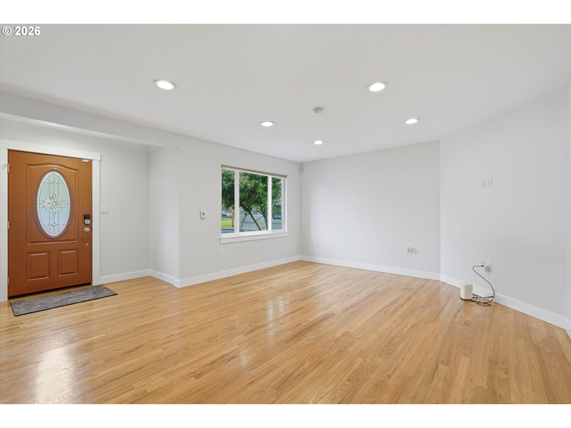 4621 Ohio Street Longview, WA 98632 - Photo 6 of 29 a view of an empty room with a window