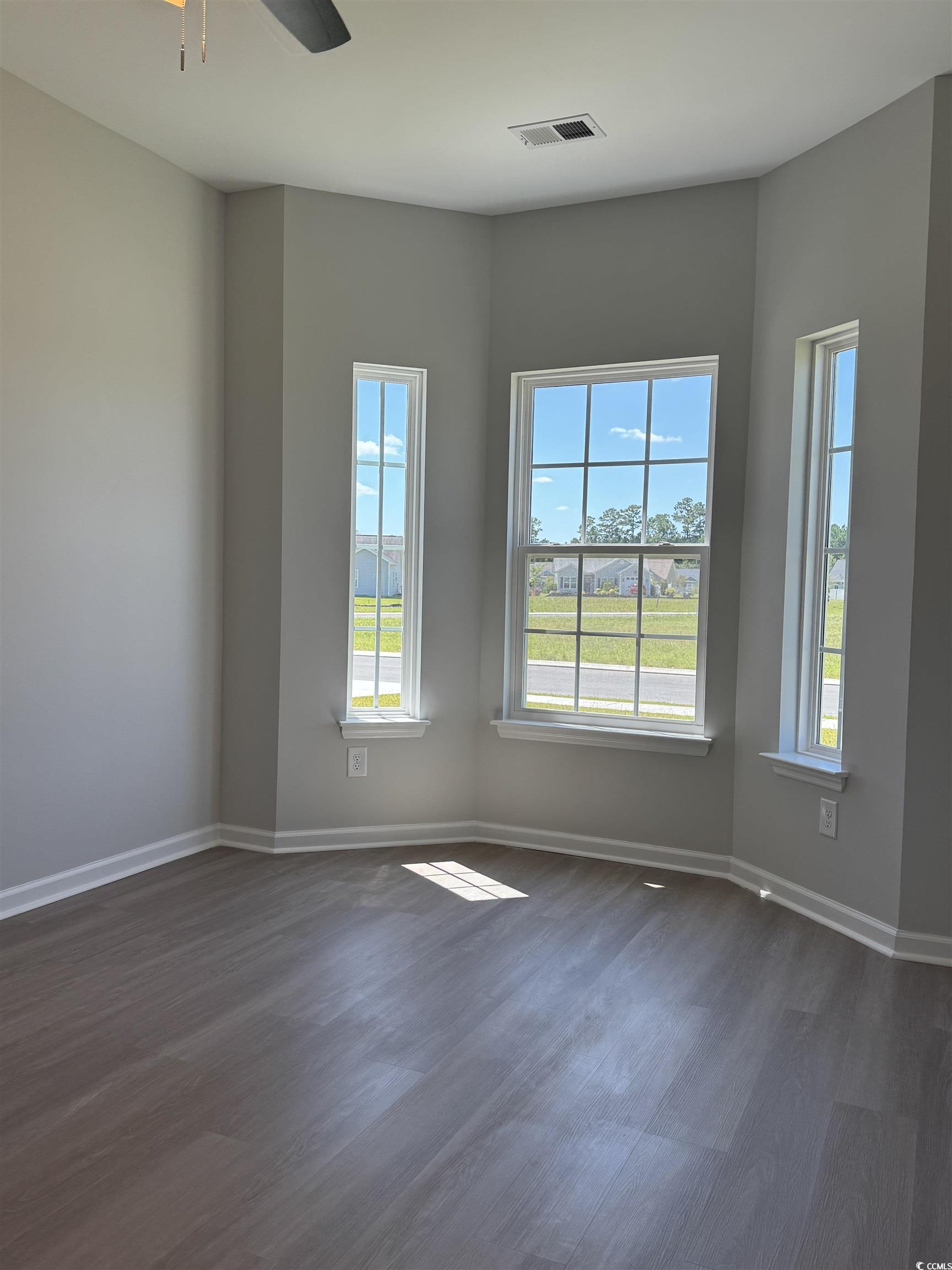 600 Shallow Cv Drive Conway, SC 29527 - Photo 7 of 14 Spare room featuring dark wood finished floors and