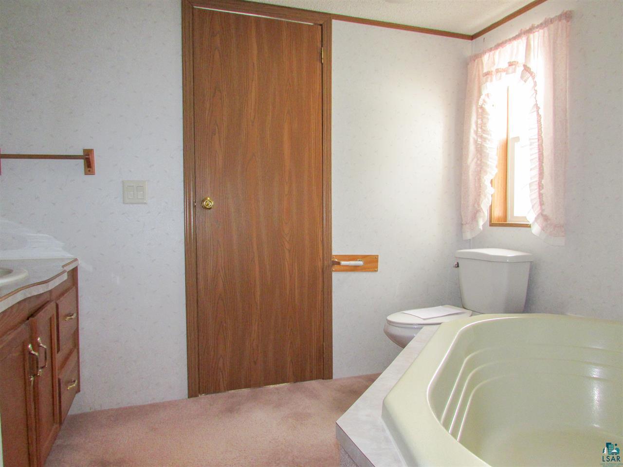7561 Industrial Road Saginaw, MN 55779 - Photo 20 of 24 Attached to bedroom