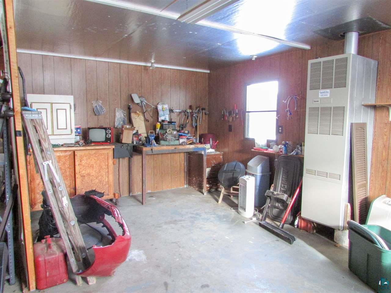 7561 Industrial Road Saginaw, MN 55779 - Photo 21 of 24 Workshop area in garage