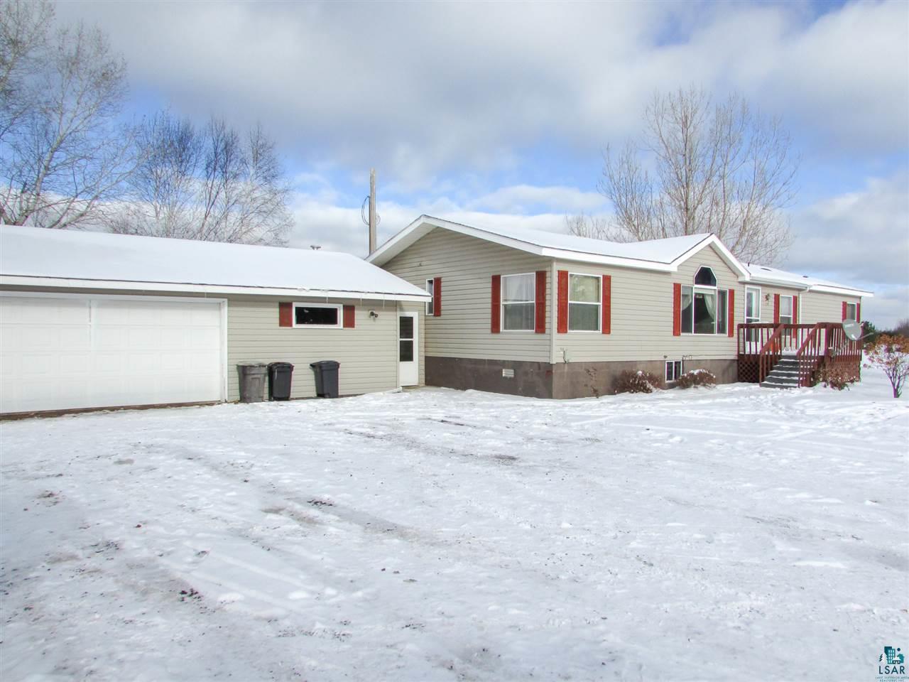 7561 Industrial Road Saginaw, MN 55779 - Photo 22 of 24 Vinyl siding