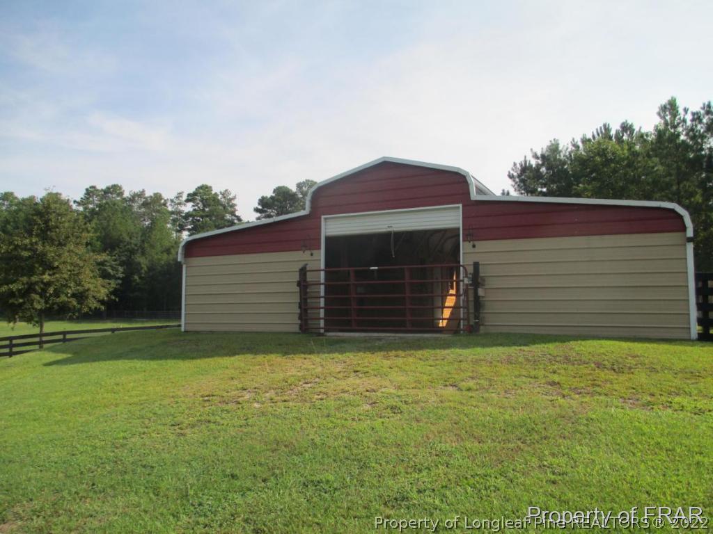 5028 Aberdeen Road Raeford, NC 28376 - Photo 32 of 34 a view of a yard