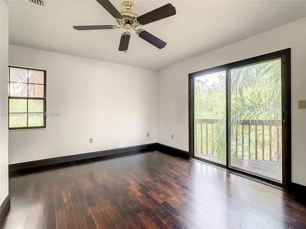 a kitchen with a sink stove and refrigerator
