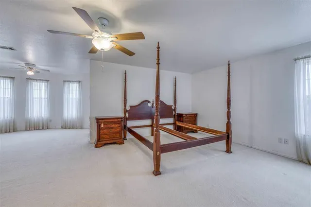 a bathroom with a sink tub shower and a mirror
