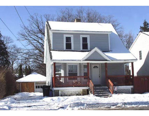 138 Jasper Street Springfield, MA 01109 - Photo 1 of 1 a front view of a house with garden