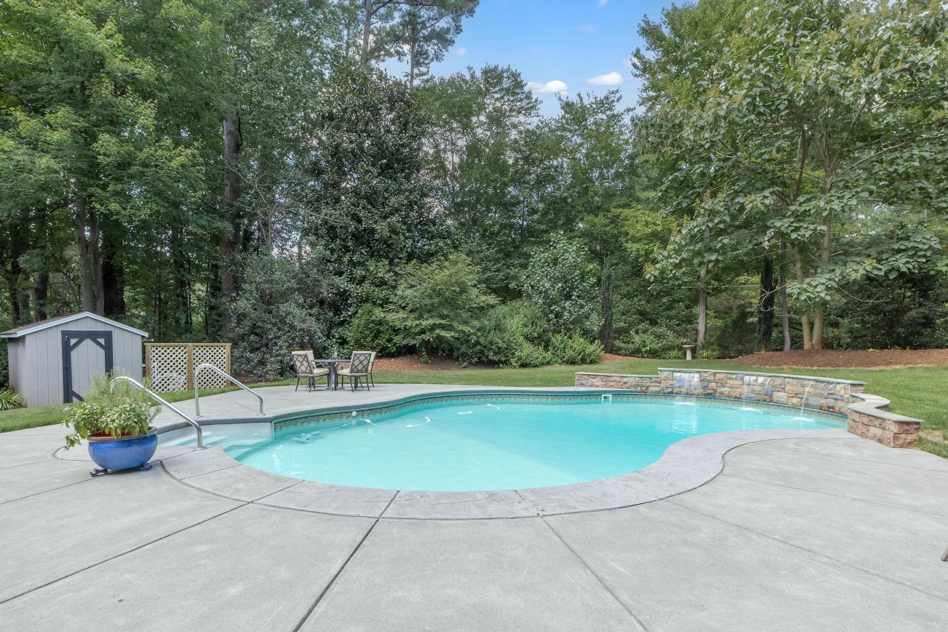 6417 Rockrest Court Raleigh, NC 27612 - Photo 41 of 56 Salt Water Pool with Waterfalls