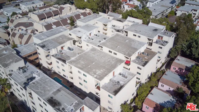 an aerial view of a city with lots of residential buildings