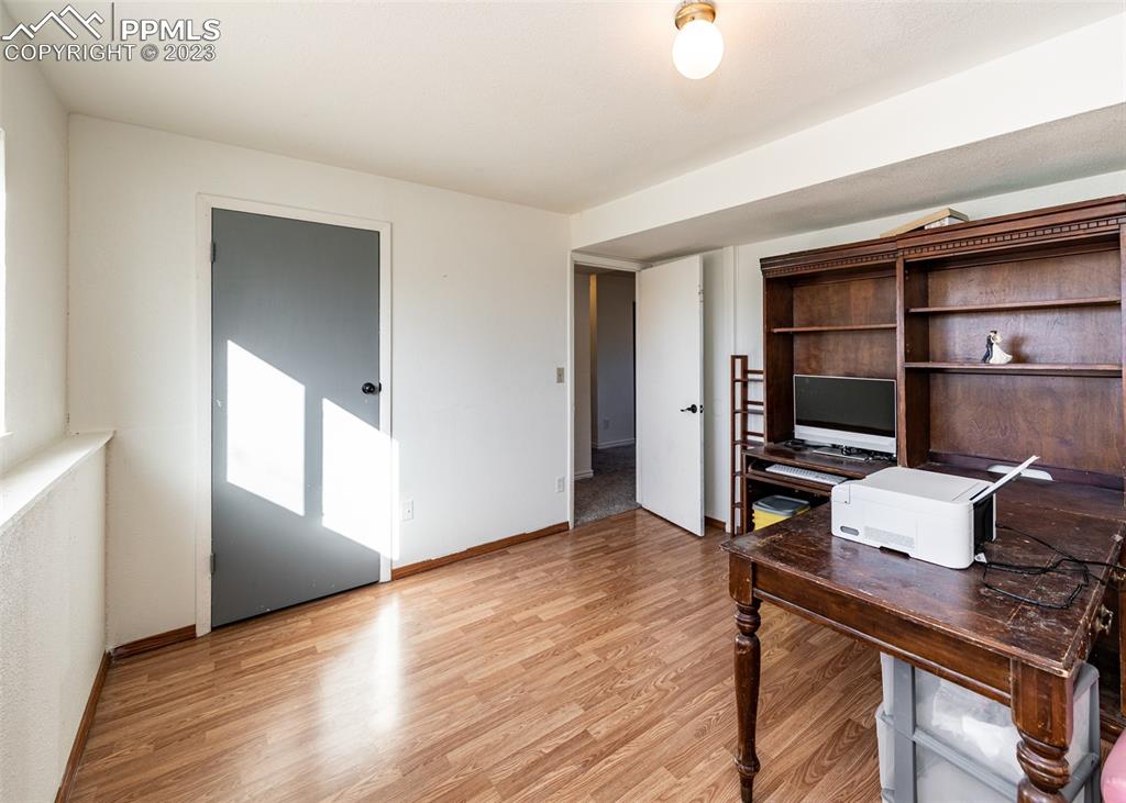 9765 Wineglass Road Fountain, CO 80817 - Photo 19 of 37 a workspace with furniture and window