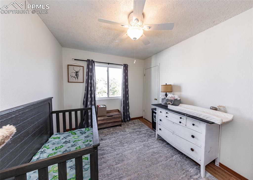 9765 Wineglass Road Fountain, CO 80817 - Photo 27 of 37 a room with furniture and windows