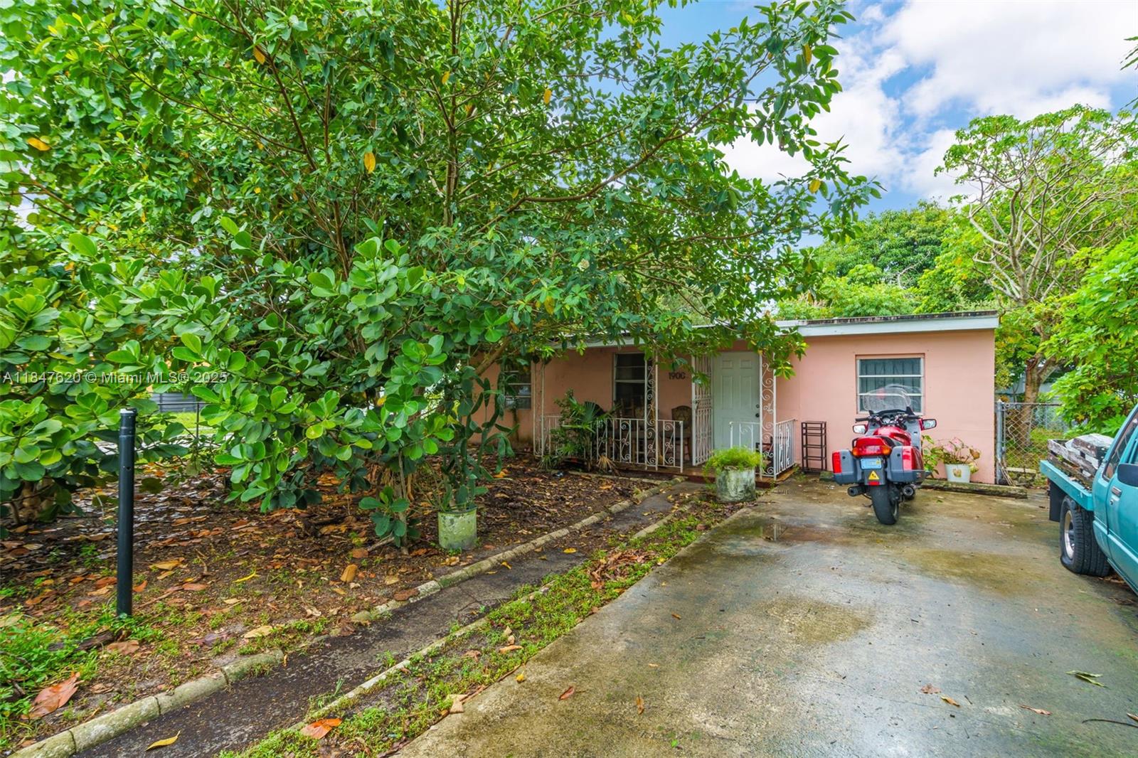 1900 Service Road Opa-Locka, FL 33054 - Photo 1 of 24 a view of a house with patio
