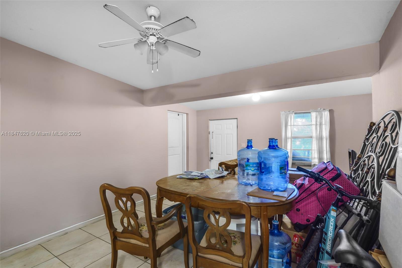 1900 Service Road Opa-Locka, FL 33054 - Photo 5 of 24 a view of a dining room with furniture