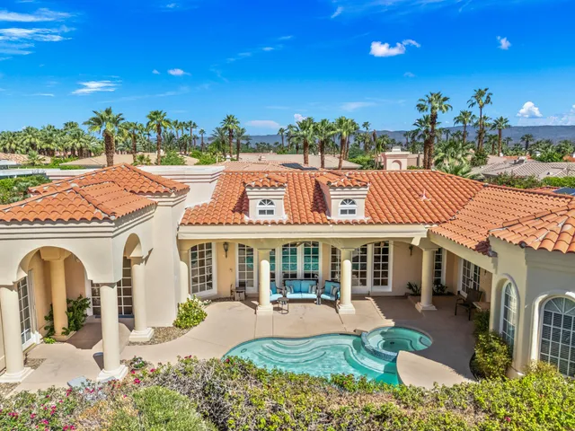 a front view of a house with a porch