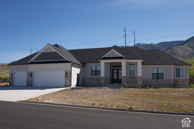 3504 North Sun Dancer Loop Logan, UT 84341 - Photo 1 of 59 Stone and siding exterior with a dark shingle roof