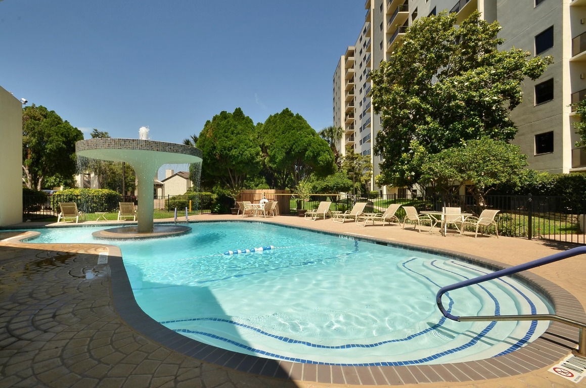 40 North Interstate Highway 35, Unit 3D3 Austin, TX 78701 - Photo 2 of 40 a view of a swimming pool with a patio