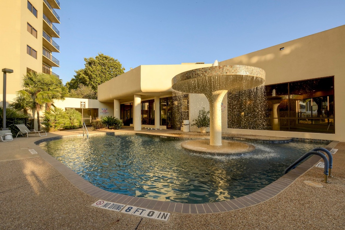 40 North Interstate Highway 35, Unit 3D3 Austin, TX 78701 - Photo 30 of 40 a view of a house with swimming pool