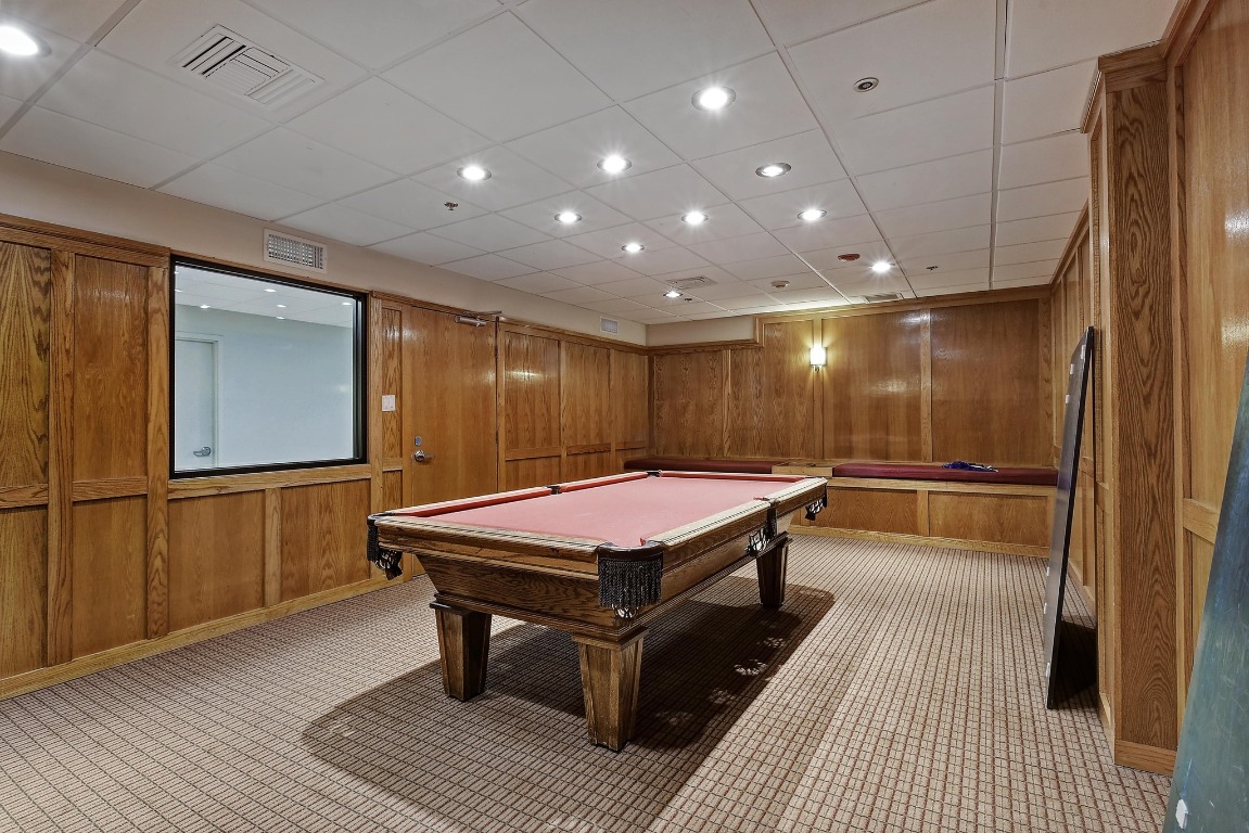 40 North Interstate Highway 35, Unit 3D3 Austin, TX 78701 - Photo 33 of 40 a room with pool table wooden floor and windows