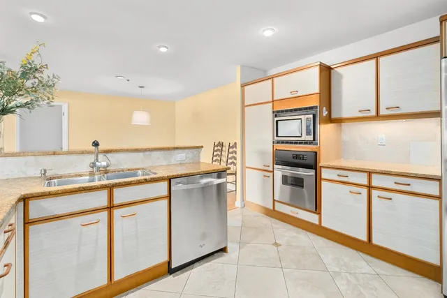 a view of bathroom with washer and dryer