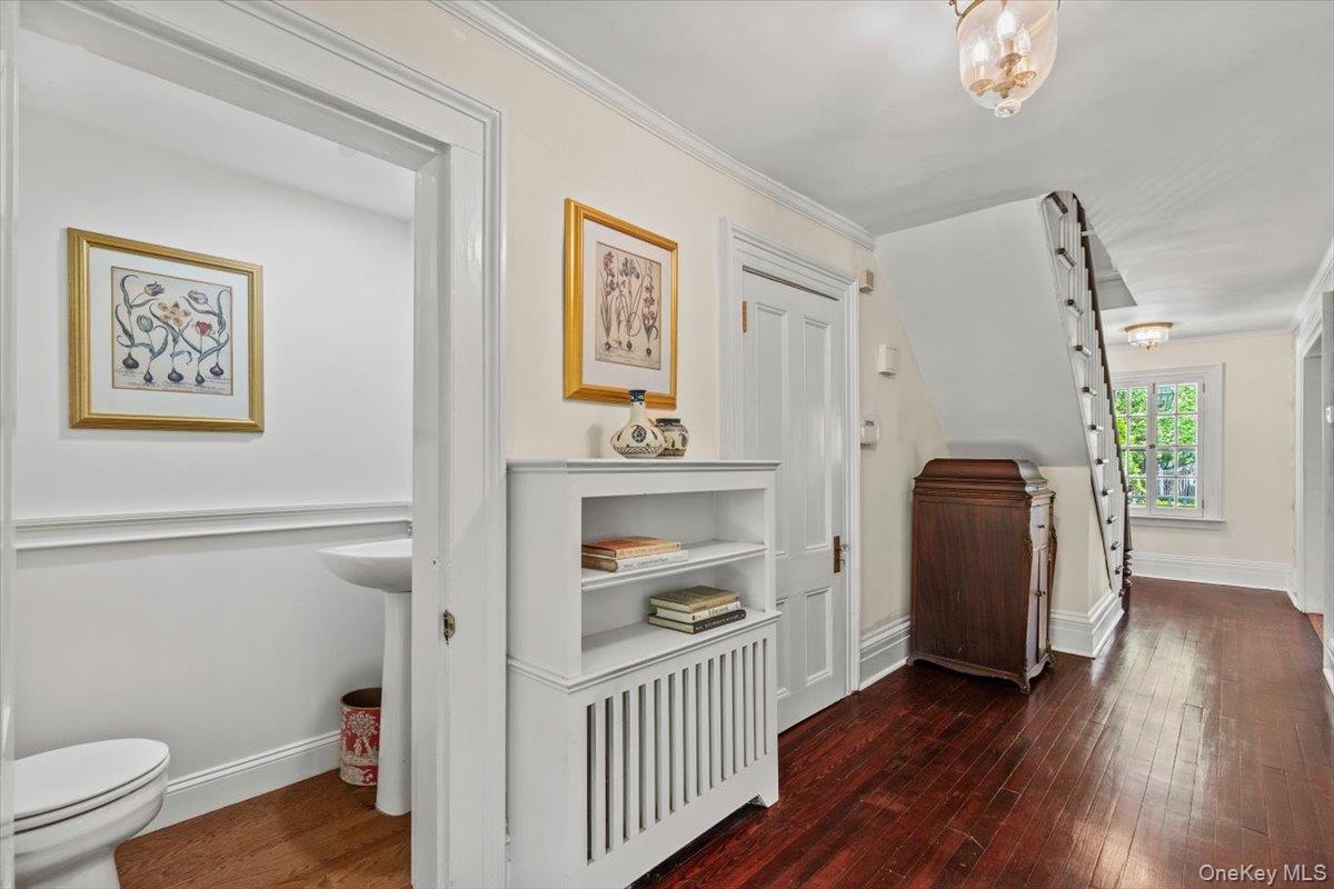655 North Street Harrison, NY 10580 - Photo 15 of 48 a view of a hallway with wooden floor and closet
