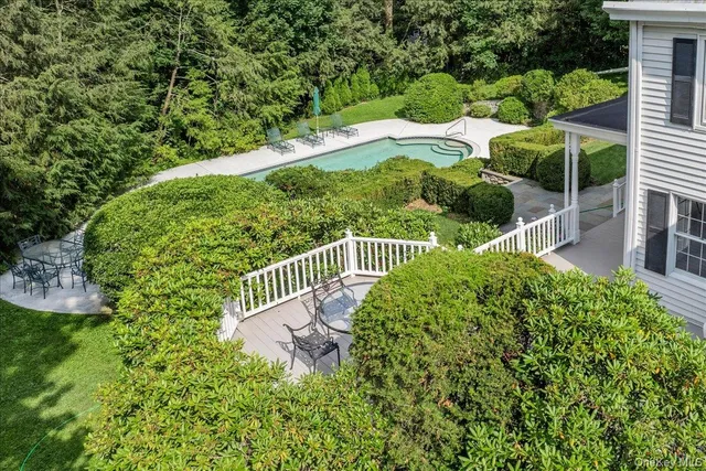 a view of a garden with an outdoor space