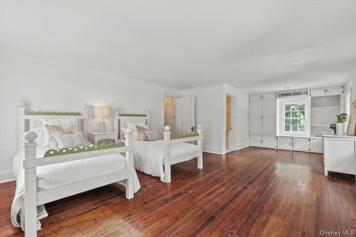 655 North Street Harrison, NY 10580 - Photo 23 of 48 a living room with furniture and a wooden floor